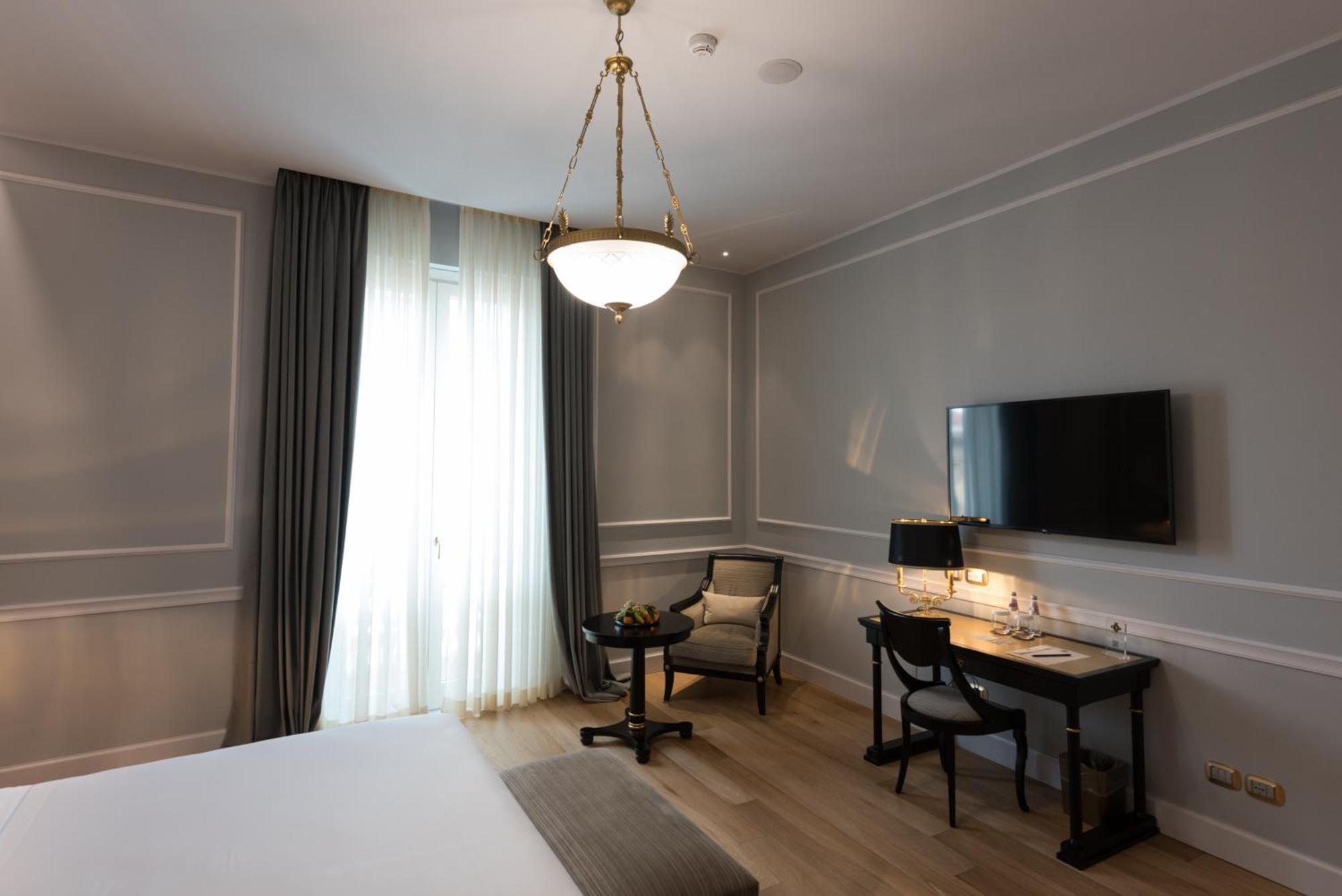 Grand Hotel Et Des Palmes ปาแลร์โม ภายนอก รูปภาพ A room at the hotel